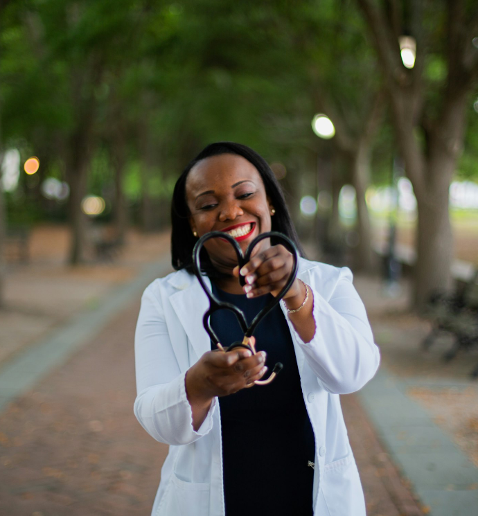 a woman holding a pair of scissors in her hands