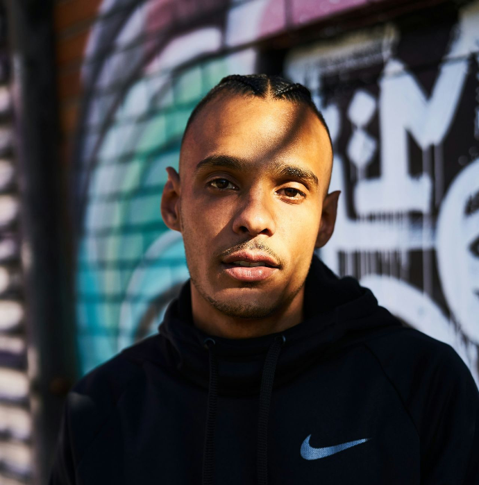 man in black Nike pullover hoodie